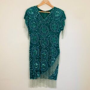 Vintage teal blue beaded and sequined dress. Beaded fringe. Size 8